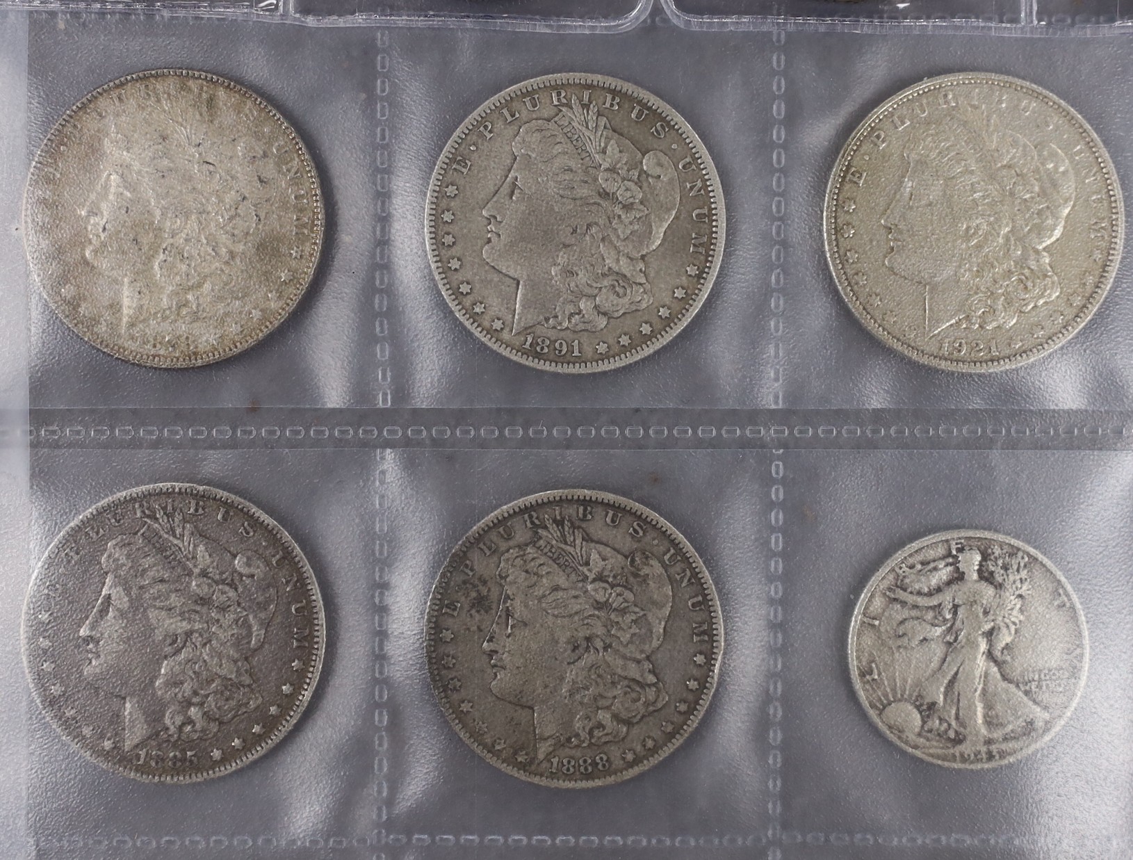 U.S.A. coins, five Morgan dollars 1878, 1888, 1891, 1895 and 1921, three other dollars 1924, 1925